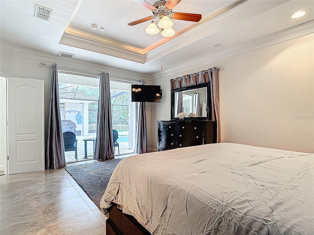 bedroom featuring a raised ceiling, access to exterior, ornamental molding, and ceiling fan