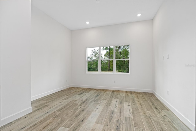 unfurnished room featuring light hardwood / wood-style flooring