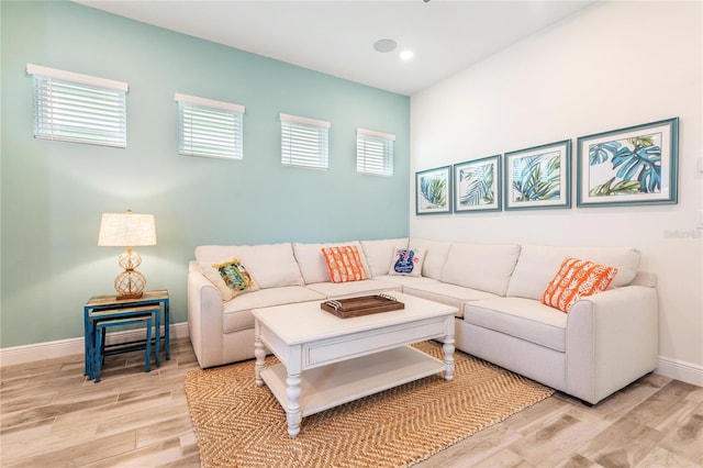 living room with light hardwood / wood-style floors