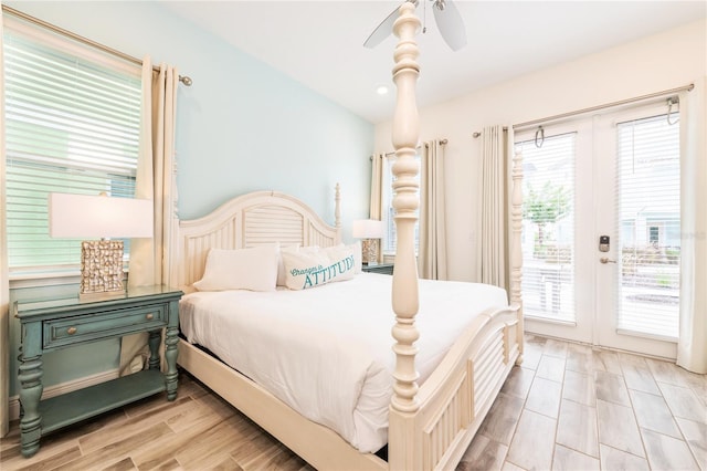 bedroom featuring french doors, access to exterior, and ceiling fan