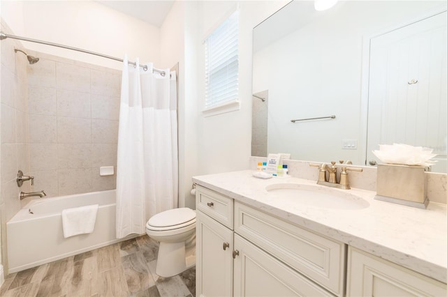 full bathroom featuring shower / tub combo with curtain, toilet, wood-type flooring, and vanity