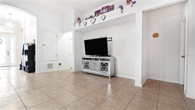728 Longford Loop, Apopka, FL 32703 - unfurnished living room featuring light tile patterned floors