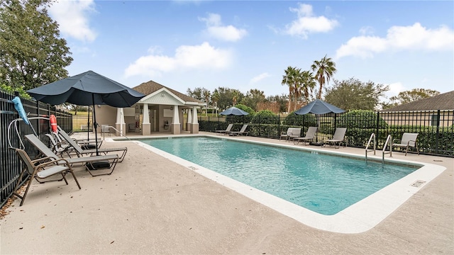 728 Longford Loop, Apopka, FL 32703 - view of swimming pool with a patio area