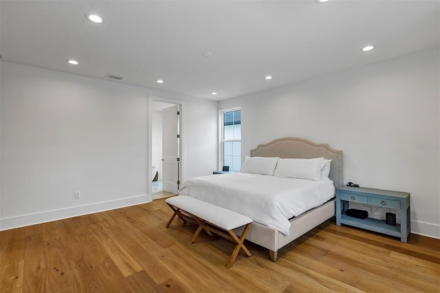 bedroom with light wood-type flooring