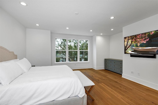 bedroom featuring hardwood / wood-style flooring