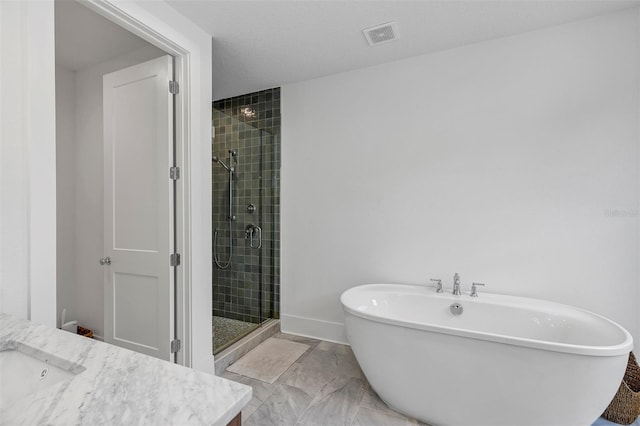 bathroom featuring vanity and plus walk in shower