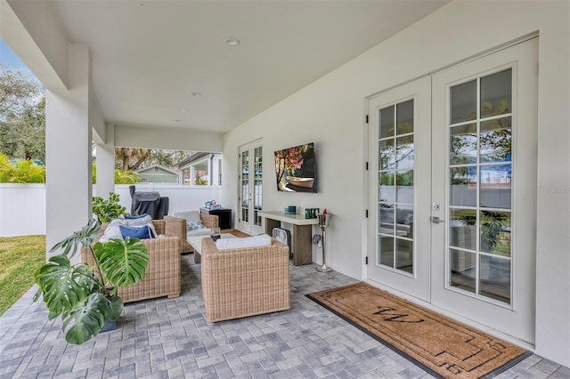 view of patio / terrace featuring an outdoor hangout area and french doors