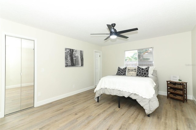 bedroom featuring ceiling fan and light hardwood / wood-style flooring