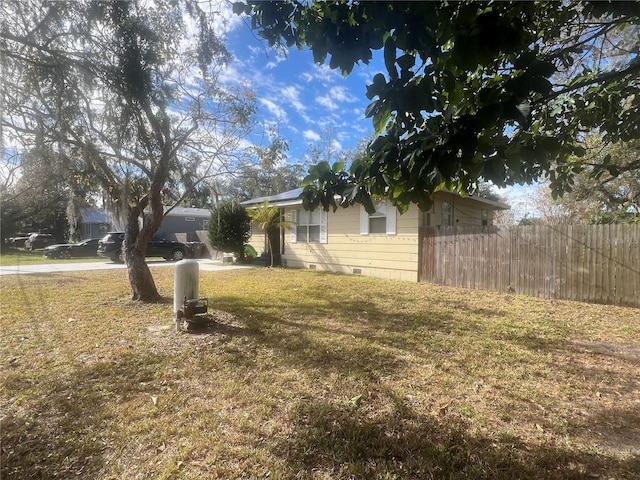 view of yard featuring fence