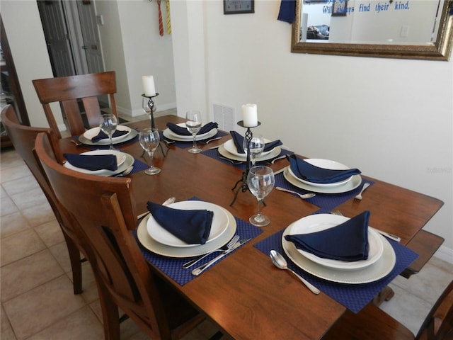 view of tiled dining space