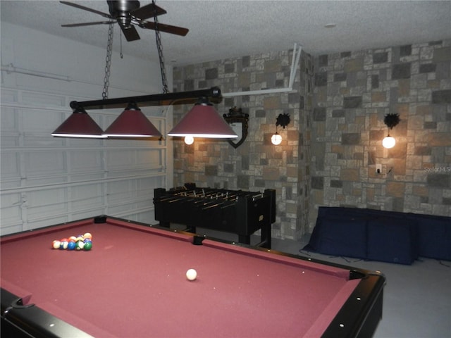 rec room featuring billiards and a textured ceiling