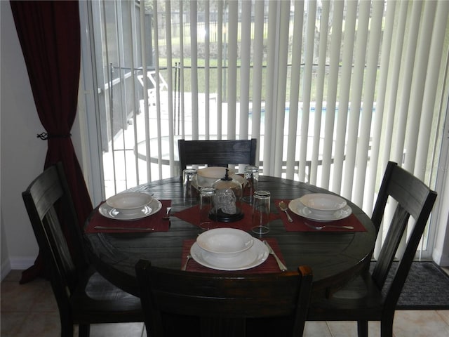 2803 Lido Key Ct, Kissimmee, FL 34747 - dining area with tile patterned flooring and baseboards
