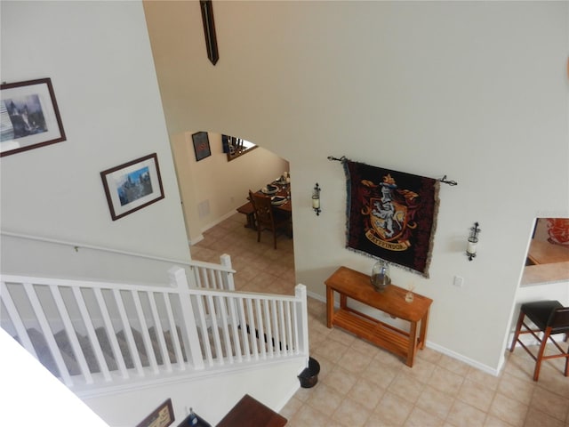 2803 Lido Key Ct, Kissimmee, FL 34747 - staircase with tile patterned floors and baseboards