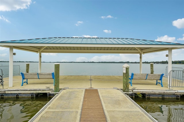 dock area with a water view and a gazebo