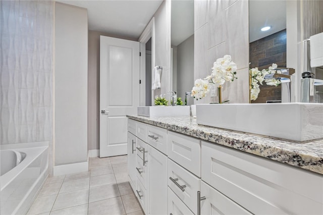 bathroom featuring tile patterned floors and vanity