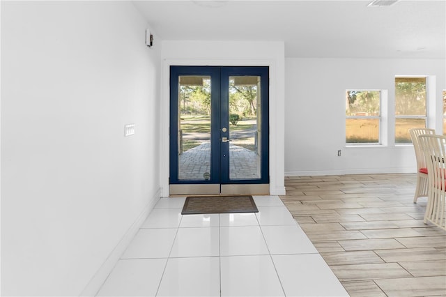 doorway to outside featuring french doors