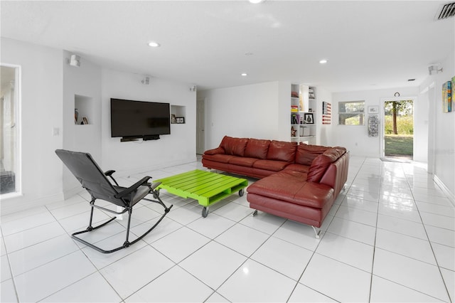 living room featuring light tile patterned flooring