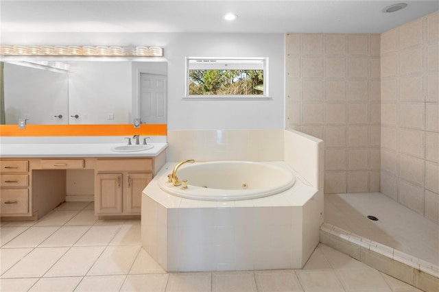 bathroom with vanity, tile patterned floors, and separate shower and tub