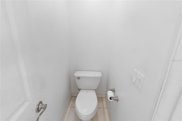 bathroom featuring toilet and tile patterned floors