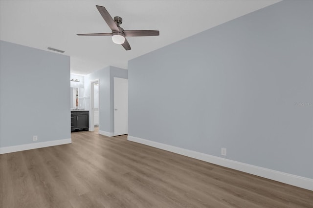 interior space featuring ceiling fan and light hardwood / wood-style flooring