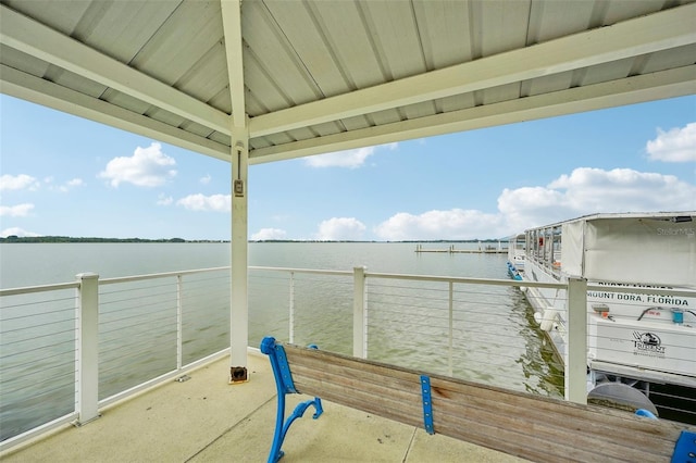 dock area with a gazebo and a water view