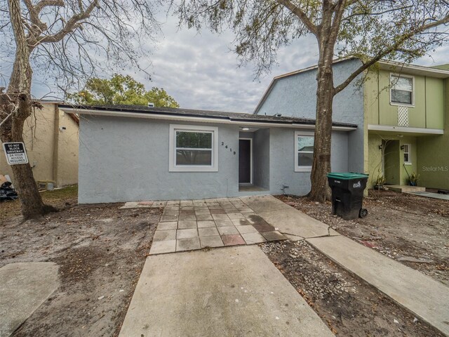 rear view of property with a patio area