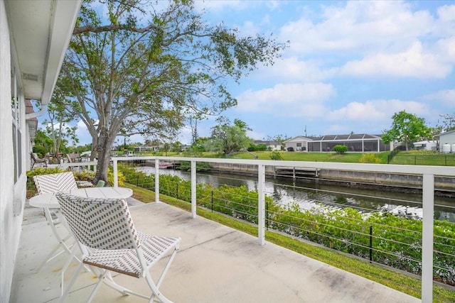 view of patio / terrace featuring a water view