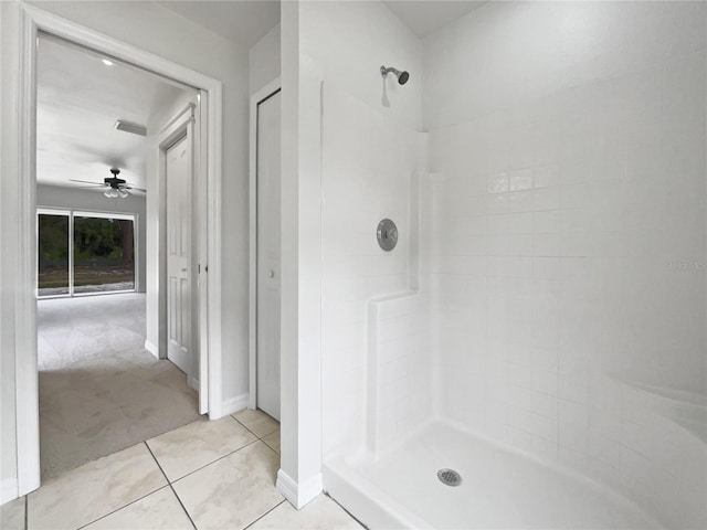 bathroom featuring walk in shower, tile patterned floors, and ceiling fan