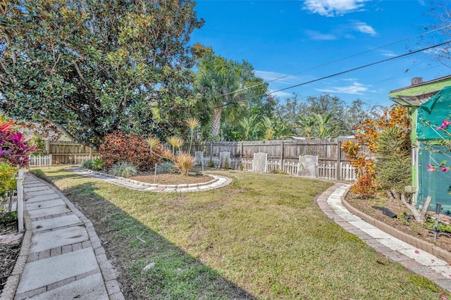 view of yard with fence