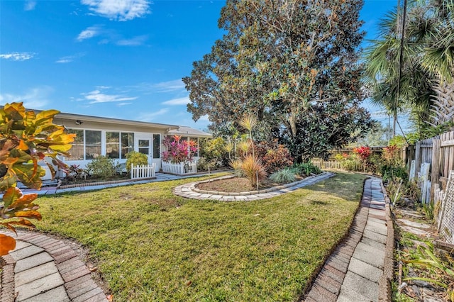 view of yard with fence