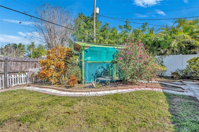 view of yard with a fenced backyard