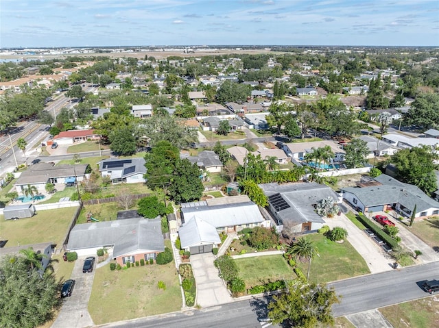 birds eye view of property with a residential view