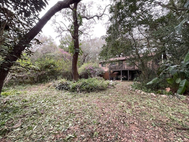 view of yard with a wooden deck