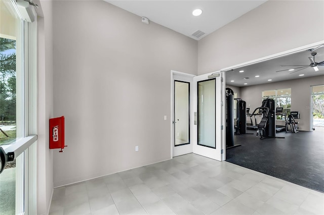 workout area with ceiling fan