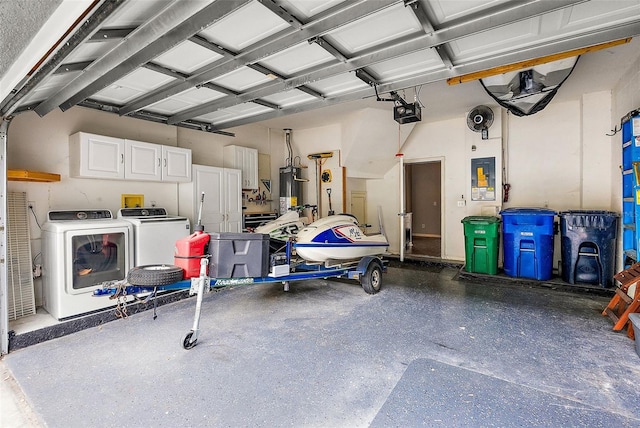 garage featuring a garage door opener, gas water heater, washer and dryer, and electric panel