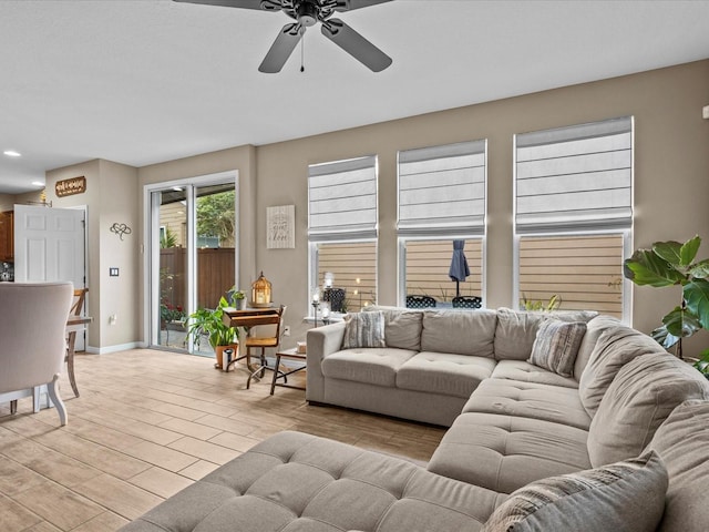 living room featuring ceiling fan