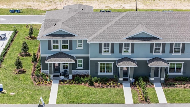 view of front of home featuring a front yard