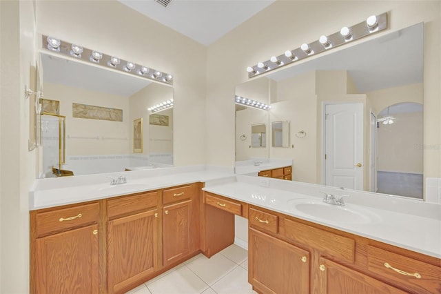 bathroom with an enclosed shower, vanity, tile patterned floors, and ceiling fan