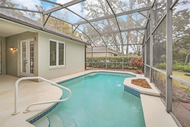 view of pool with a lanai