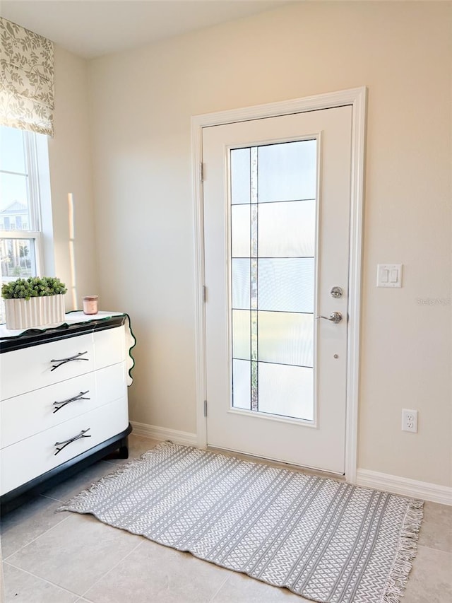 entryway featuring light tile patterned flooring