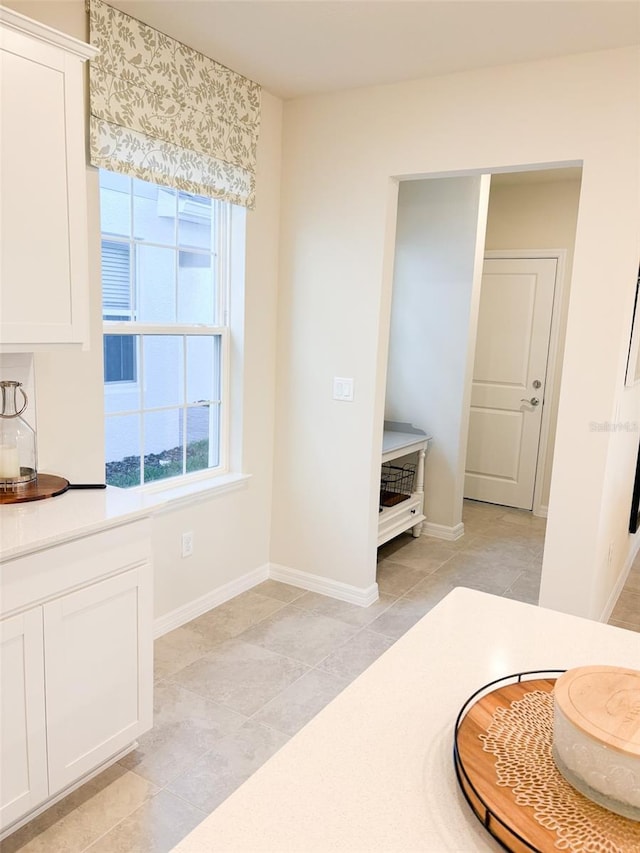 bathroom with tile patterned flooring