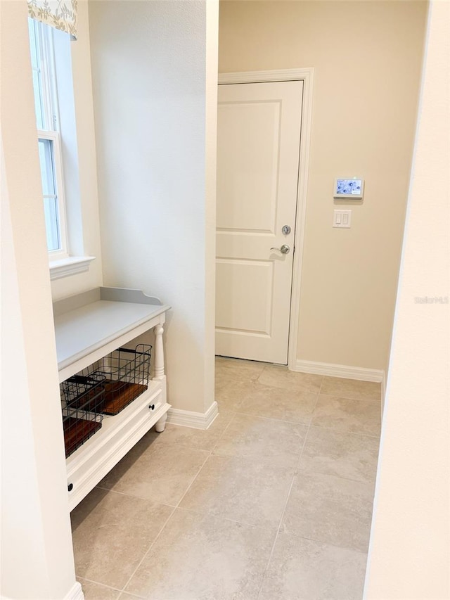 mudroom featuring light tile patterned floors