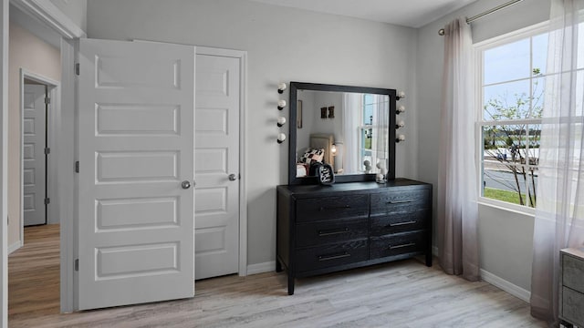 bedroom with light hardwood / wood-style floors