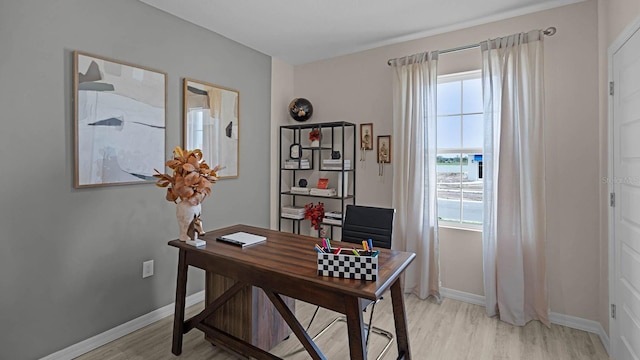 office space with light hardwood / wood-style floors