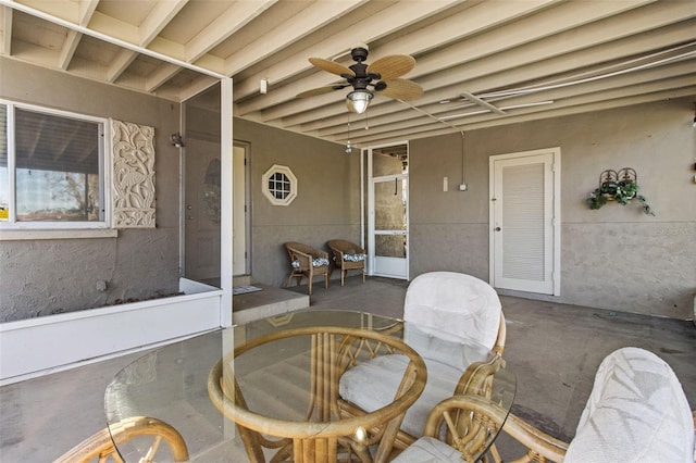 view of patio featuring ceiling fan