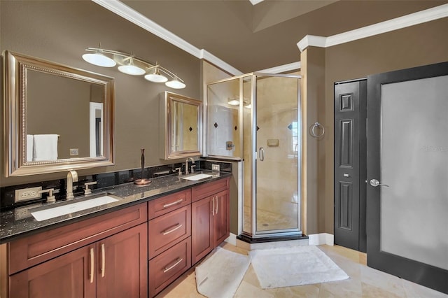 bathroom with a shower with door, ornamental molding, and vanity