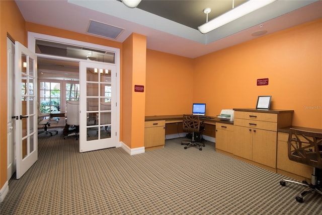 home office featuring french doors and carpet floors