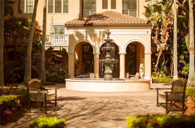 view of home's community featuring a patio