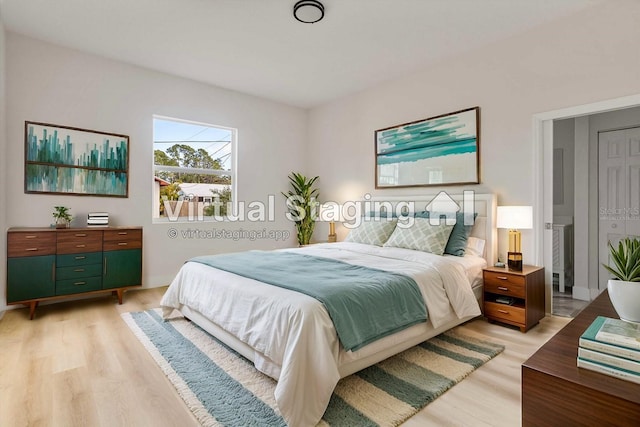 bedroom with light wood-type flooring