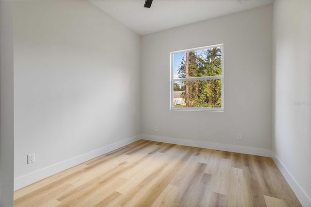 spare room with light hardwood / wood-style floors